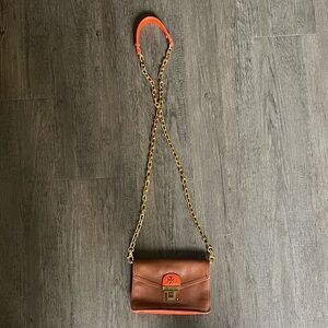 Tory Burch camel and orange cross body purse